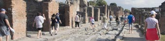 View of a main street in the ruins of Pompie, Italy where Roman chariots once ruled View of a main street in the ruins of Pompie, Italy where Roman chariots once ruled